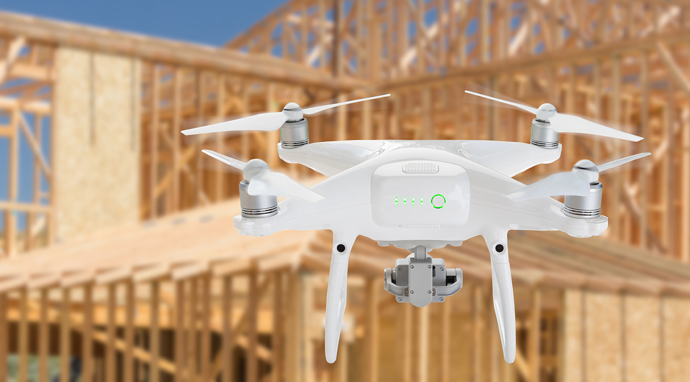 Aerial drone being flown by one of our home inspectors over a new house construction site